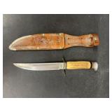 German made hunting knife with deer embossed