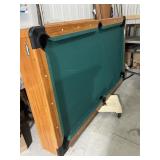 Pool table with hockey and ping-pong gaming b