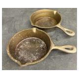 (2) small size cast-iron skillets