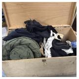 Military trunk with uniforms and clothing