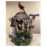 Decorative bird cage with birds