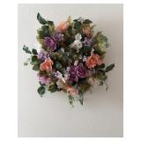 Artificial flower wreath