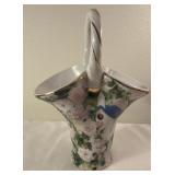 Roses and birdhouse vase