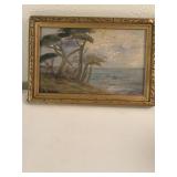 Painting on board trees by ocean