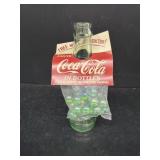Coca-Cola bottle with marbles advertising