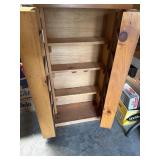 Two door cabinet with shelves