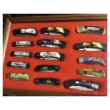 Pocket knife display case with knives