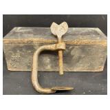 Antique clamp and wooden block