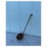 Early primitive metal scoop