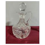 Cut glass bottle with stopper