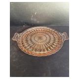 Double handled pink glass plate
