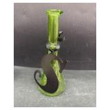 Green bottle with S