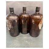 (3) amber bottles