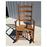Wicker bottom rocking chair