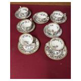 Cornet England, tea, cups, and saucers