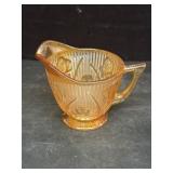 Carnival glass creamer