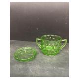 Green glass, sugar, dish, and coaster