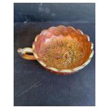 Carnival glass bowl with handle
