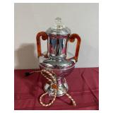 Antique coffee pot with bake light handles
