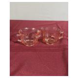 Pink glass, cream, and sugar