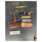Pocket knives and sharpening stones