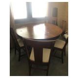 Dining Room Table w/(4) Chairs w/2 extra leaves
