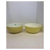Two yellow Pyrex bowls