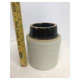 Brown and white stoneware crock