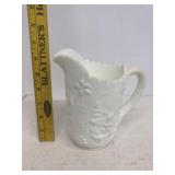 White decorative pitcher