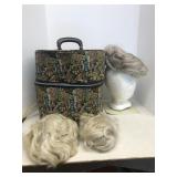 Group of wigs and hat box