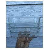 Three Pyrex baking dishes