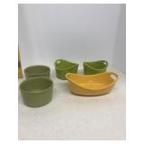 A lot of Rachel ray dishes and two small lime