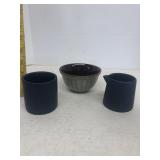 Blue stoneware creamer and sugar set and a green