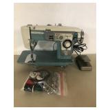 Wizard sewing machine with extra accessories