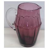 Cranberry glass pitcher