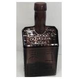 Old cabin whiskey bottle