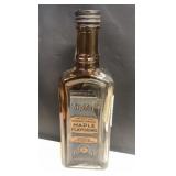 Tip top maple flavoring advertising bottle