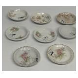 Group of miniature butter pattern plates