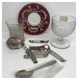 Group of bottle openers, glasses, plate, seashell