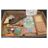 Flat of small toys, Western Cap Gun,