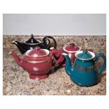 Four Hall Teapots