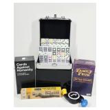 Dominoes, Cards Against Humanity, Bop It!