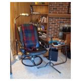 Swivel Massage Chair, Magazine Rack, Books, Lamp