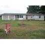 REAL ESTATE AT PUBLIC AUCTION