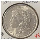 1885 MORGAN SILVER DOLLAR (90% SILVER) (AU-55)