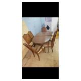 Table with leaf and 6 chairs