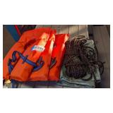 3 life jackets, ski rope