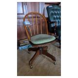 Swivel desk chair on casters