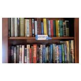 2 shelves of books, assortment of sports, novels,