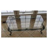 Plate glass coffee table w/iron base 30x54'